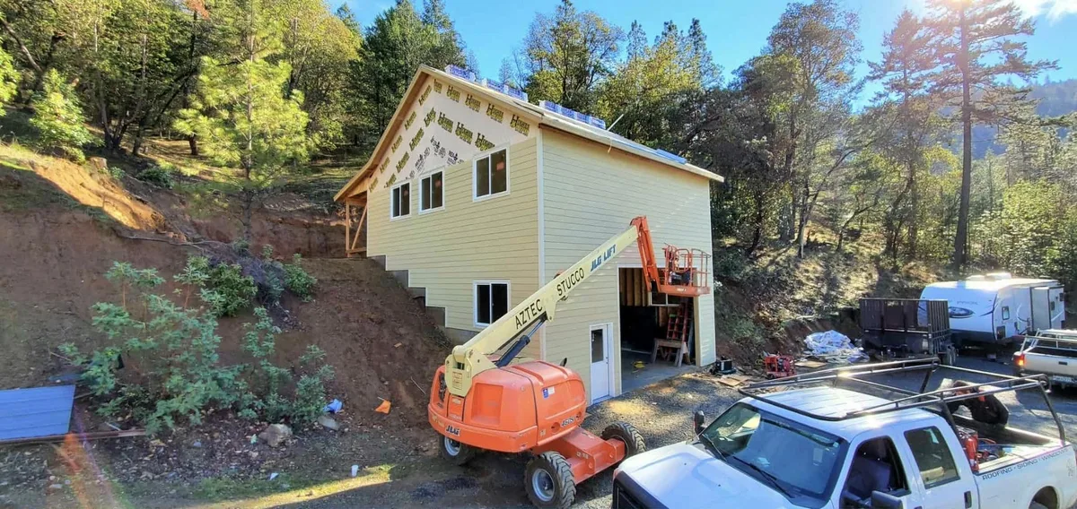 Next Gen Contracting crew installing siding on a Southern Oregon home